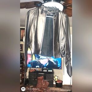 Bebe leather fringed sleeve jacket